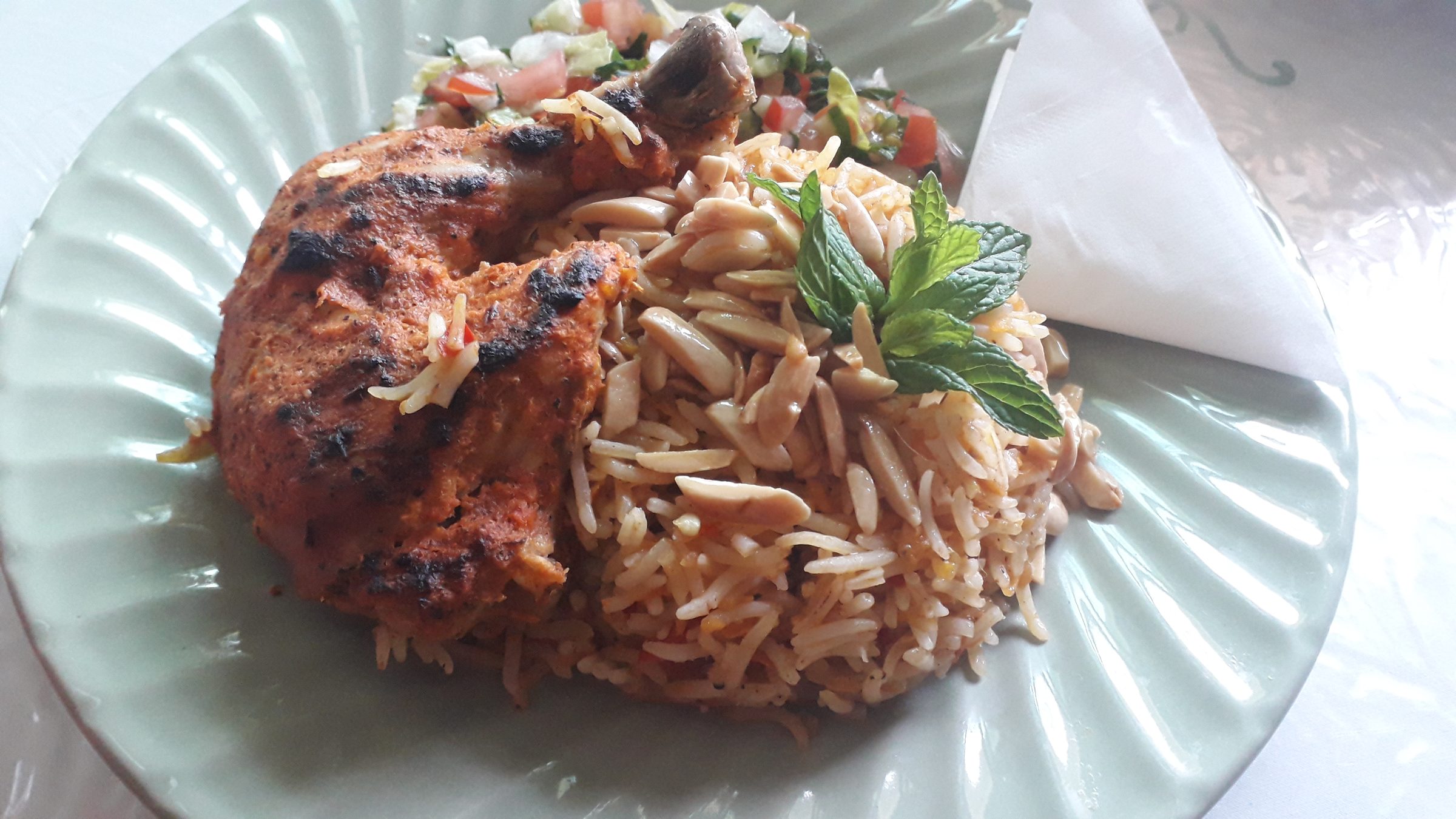 Gazan-Style Chicken Kabsa โ Chicken and basmati simmered with warm spices, tomato and a squeeze of orange โ Gaza's take on kabsa.