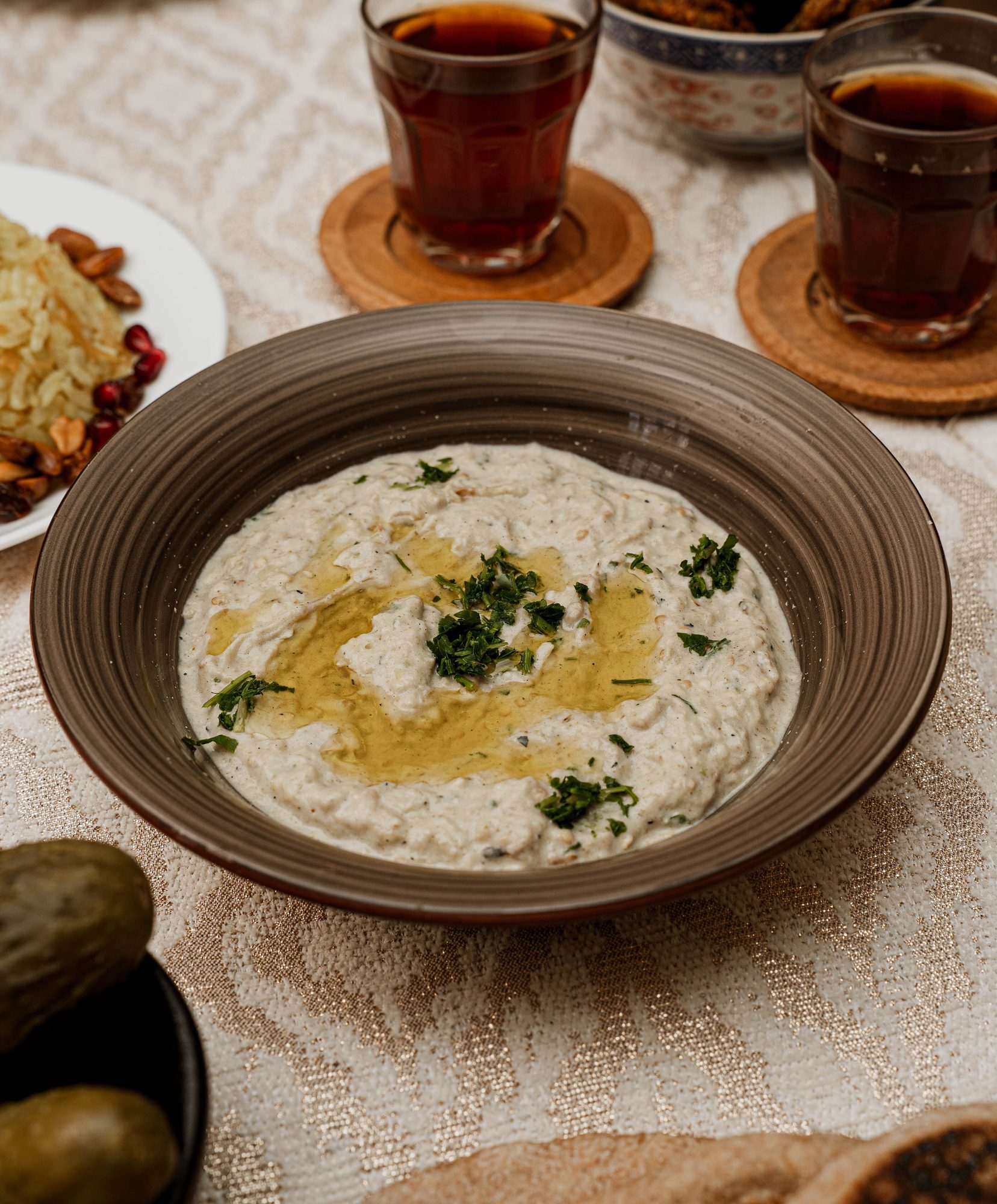 Palestinian Eggplant Moutabal โ Smoky flame-roasted eggplant folded into lemony tahini โ the essential of every mezze table.