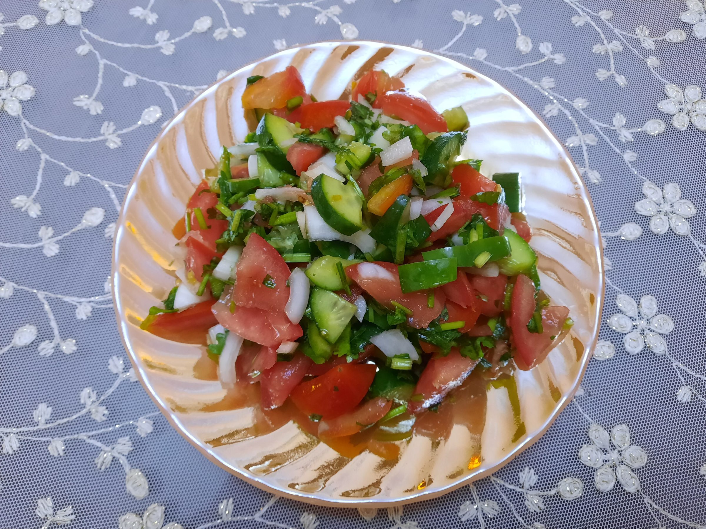Gaza Salad โ Tomatoes, cucumber and white tahini with lemon and olive oil โ Gaza's bright, tangy table salad.